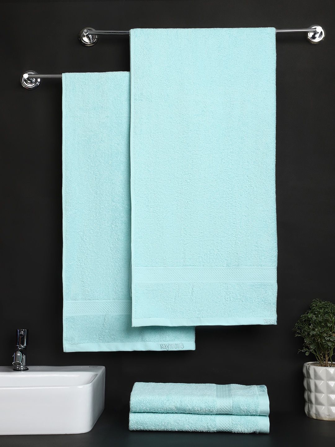 Raymond Home Set of 4 Blue Solid 380 GSM Pure Cotton Towel Set Price in India