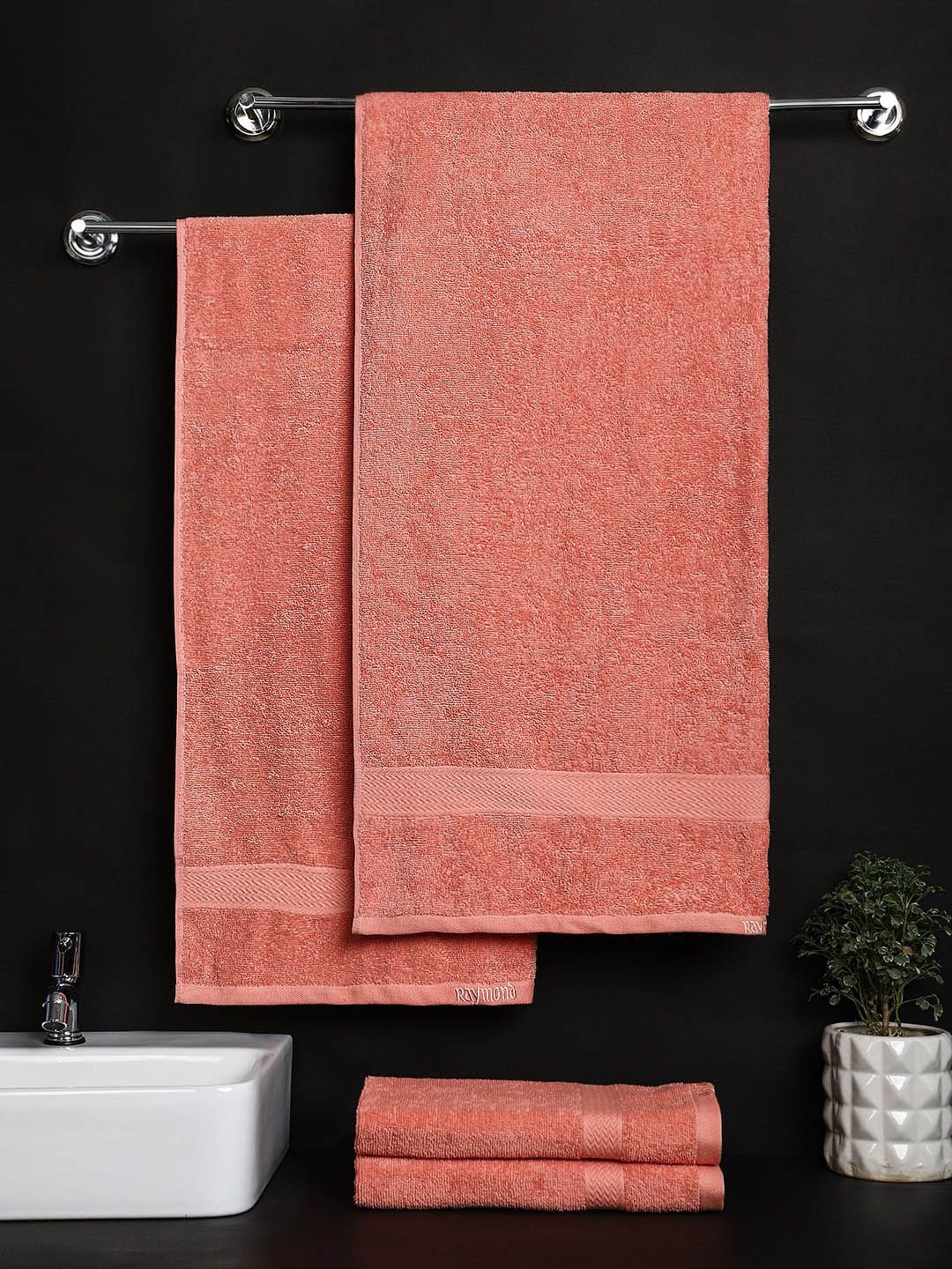 Raymond Home Set of 4 Orange Solid 380 GSM Cotton Towel Set Price in India