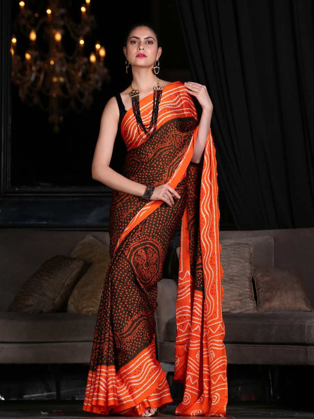 KARAGIRI Black & Orange Bandhani Silk Blend Saree Price in India