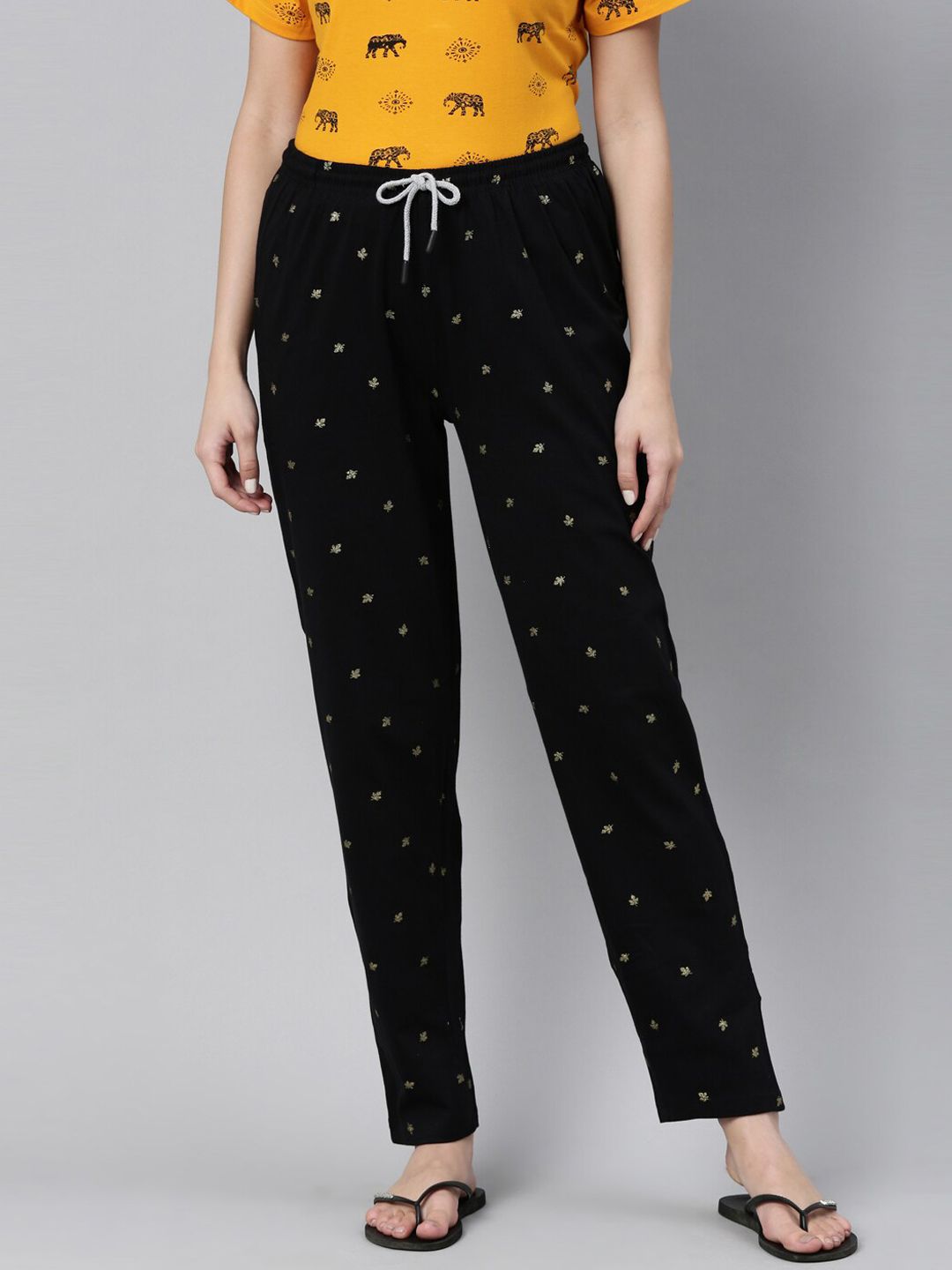 Kryptic Women Black & Golden Leaf Printed Cotton Lounge Pants Price in India