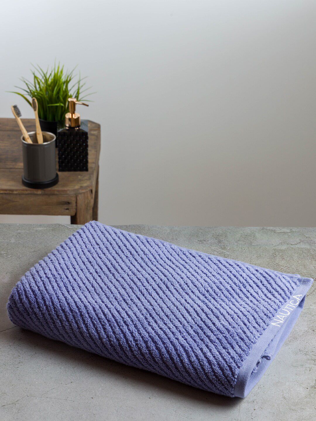 Nautica Adults Blue Solid Pure Cotton 600 GSM Bath Towel Price in India