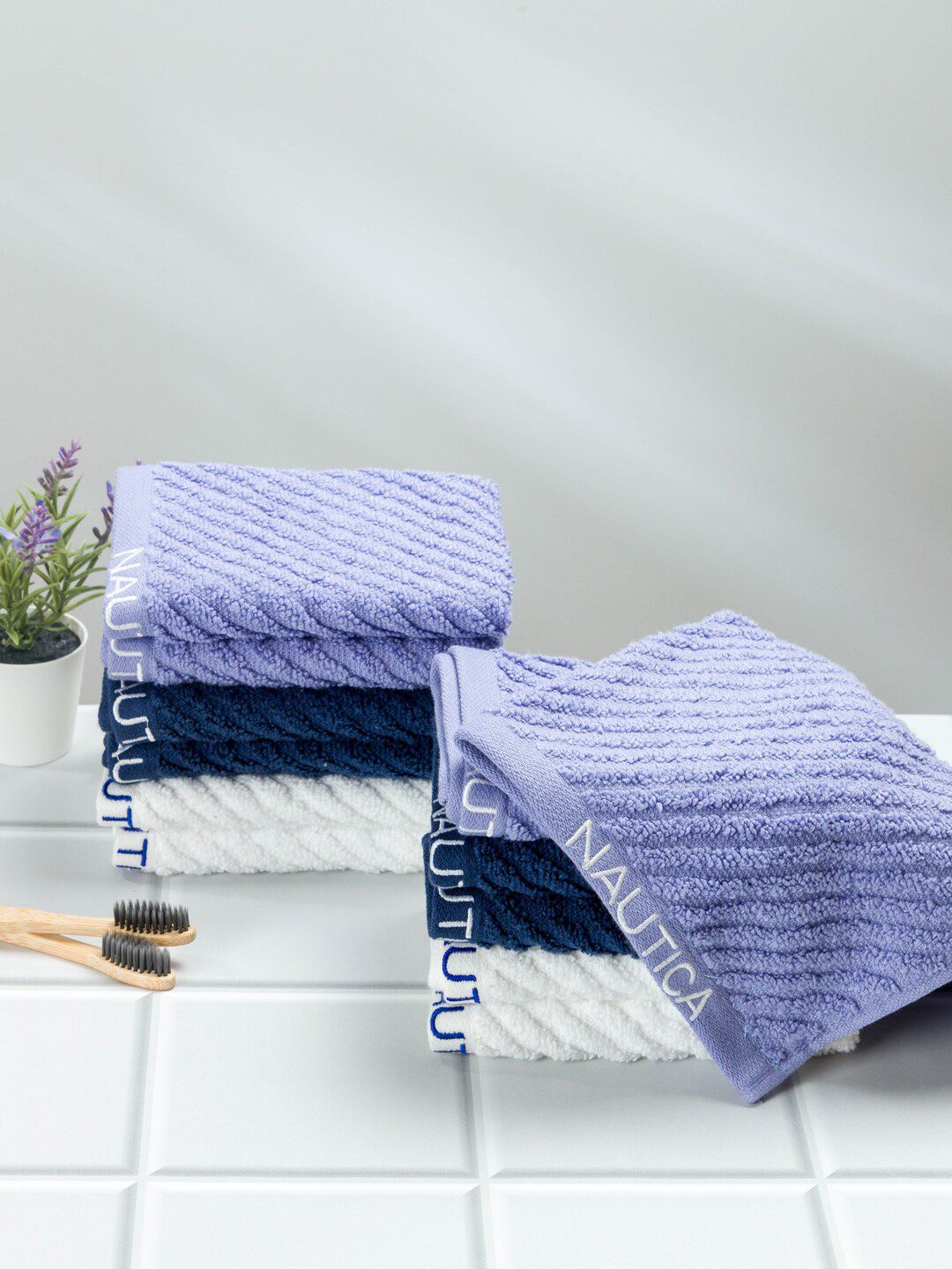Nautica Adults Set Of 12 Solid 600 GSM Pure Cotton Face Towels Price in India
