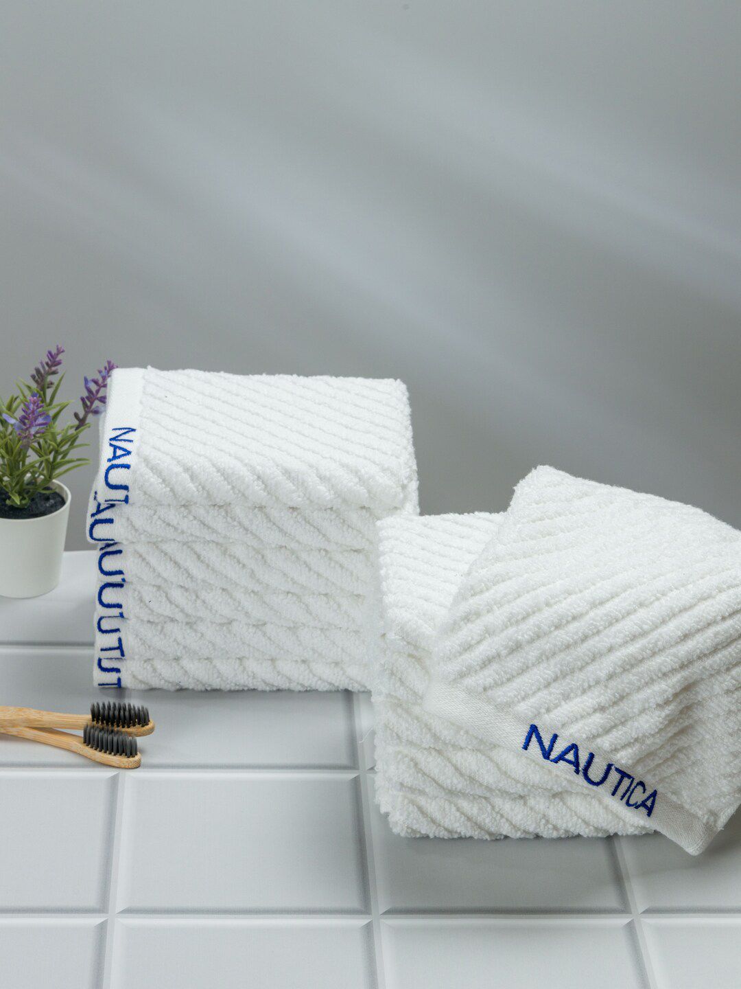 Nautica Set Of 12 White Solid Cotton 600 GSM Face Towels Price in India