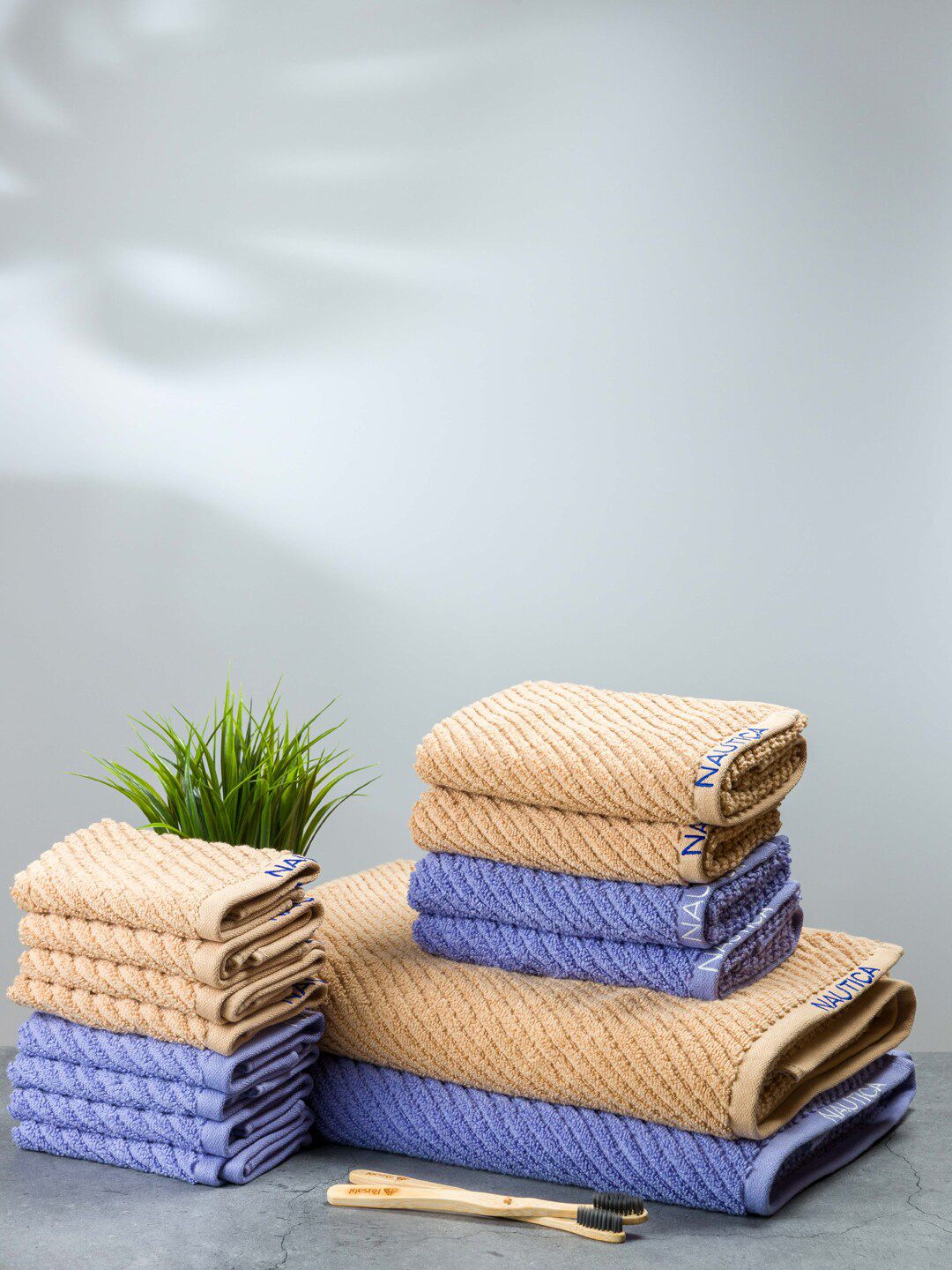 Nautica Set Of 14 Beige & Blue Solid 600 GSM Pure Cotton Towel Set Price in India