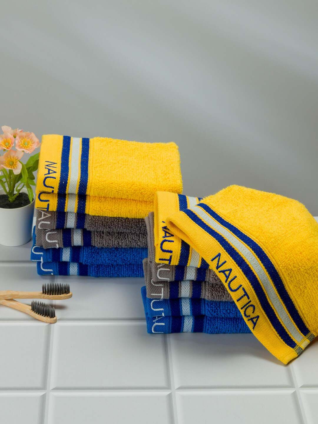 Nautica Set of 12 Blue & Yellow Solid Pure Cotton Face Towels Price in India
