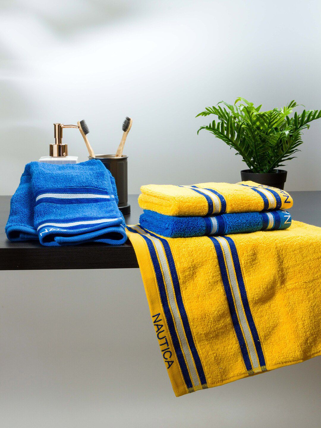 Nautica Set Of 4 Solid 500 GSM Pure Cotton Hand Towels Price in India