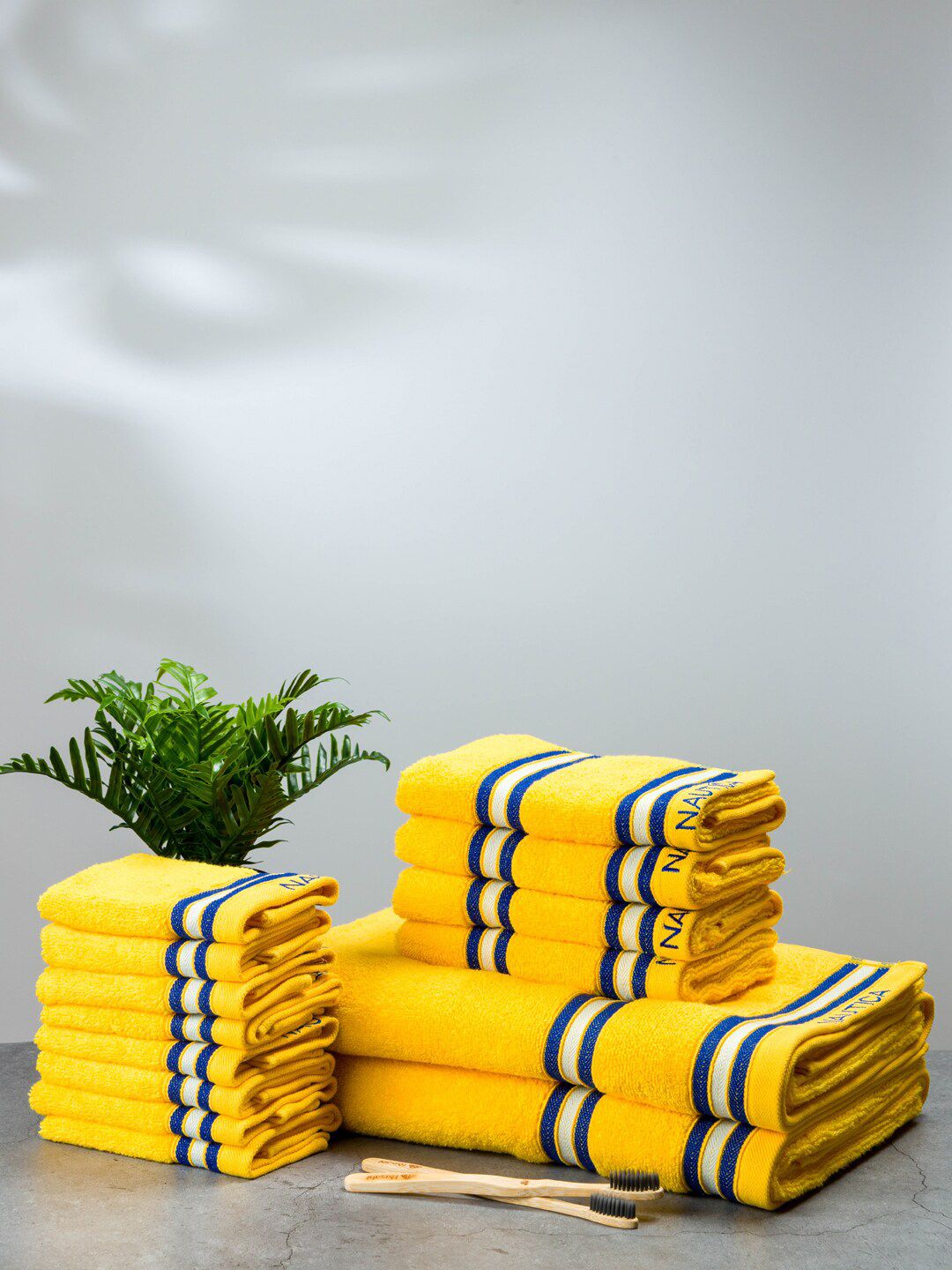Nautica Set Of 14 Yellow Solid 500 GSM Pure Cotton Bath, Hand & Face Towel Set Price in India