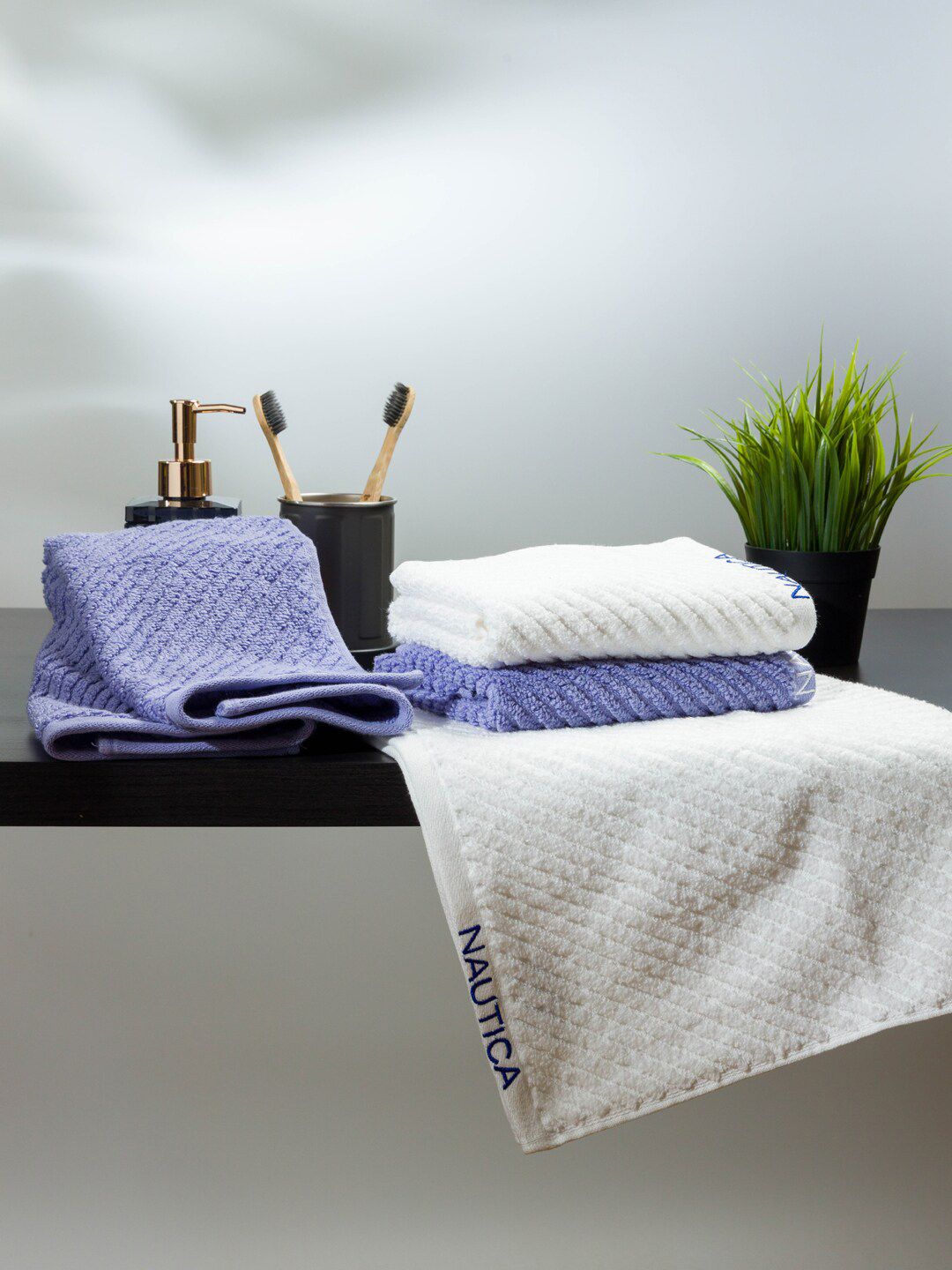 Nautica Set Of 4 White & Lavender Solid 600 GSM Pure Cotton Hand Towels Price in India