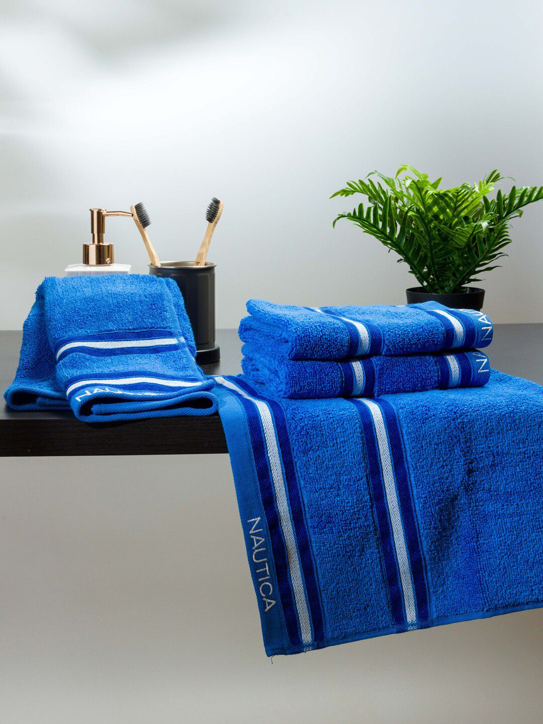 Nautica Set Of 4 Blue Solid 500 GSM Pure Cotton Hand Towels Price in India