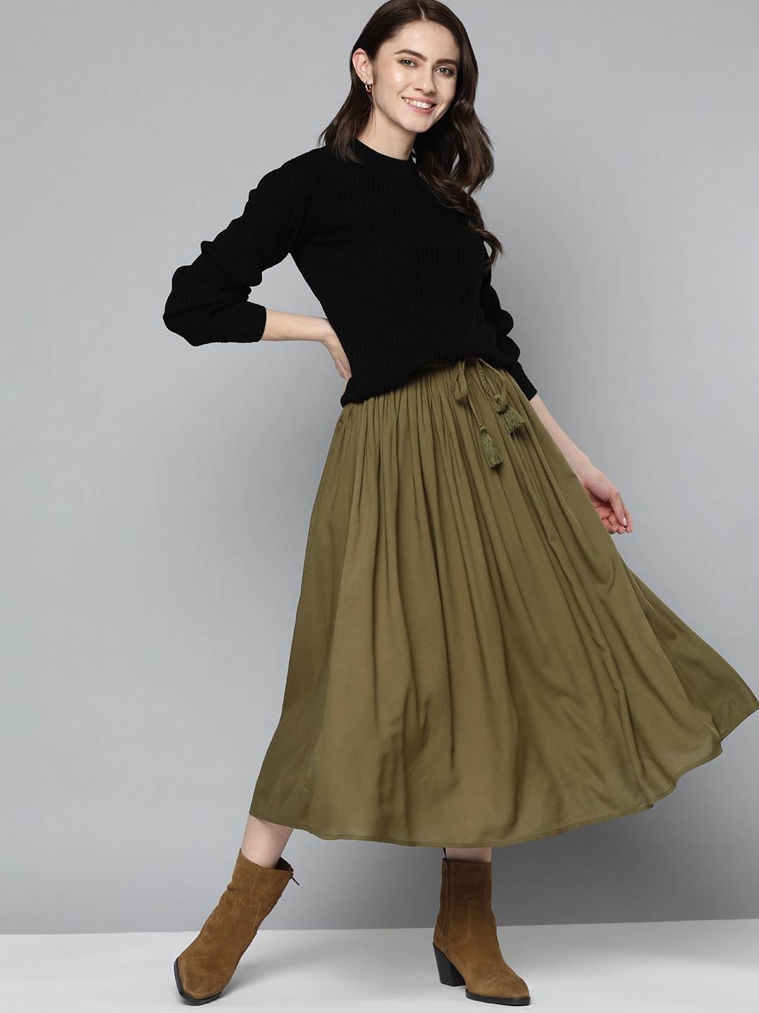 Mast & Harbour Women Olive Green Solid Flared Midi Skirt Price in India