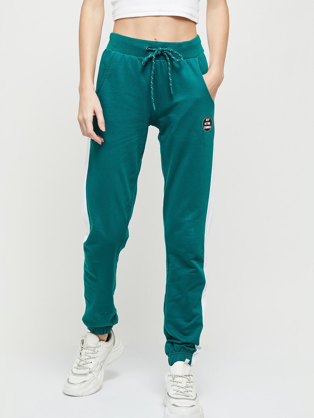 max Women Teal Solid Pure Cotton Sports Joggers Price in India