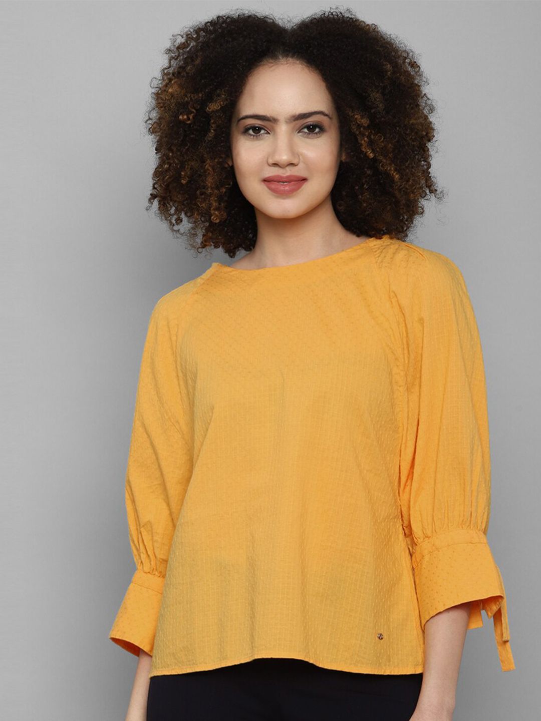 Allen Solly Woman Yellow Solid Cotton Top Price in India