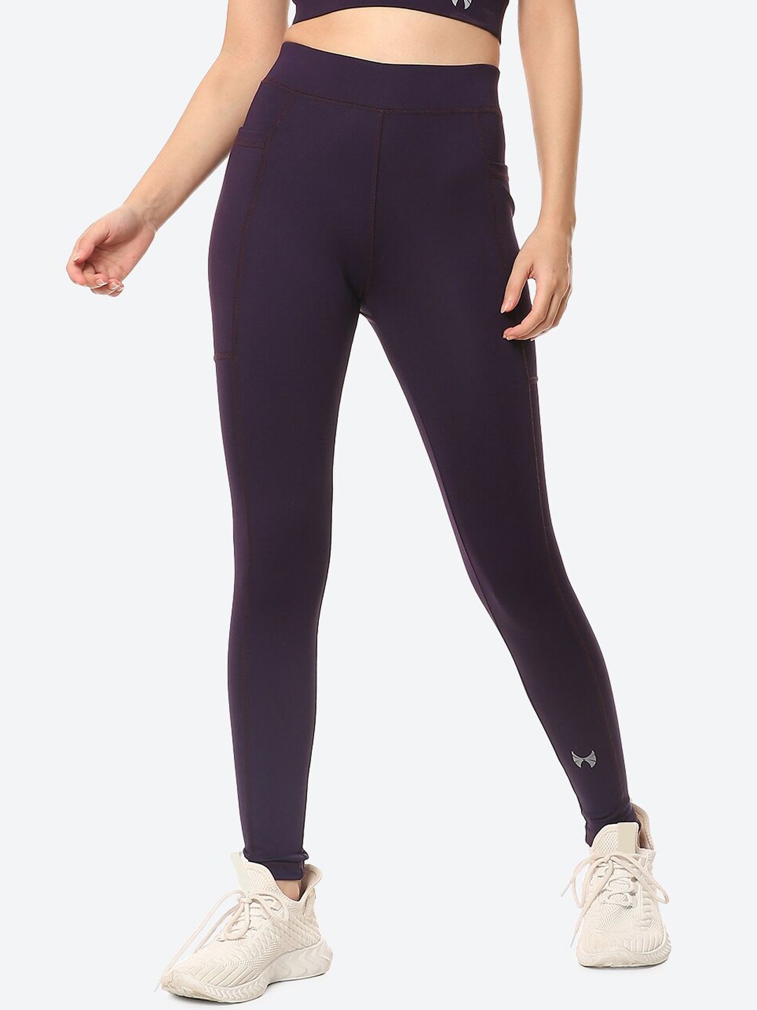 skyria Women Violet Solid Ankle Length Training Tights Price in India