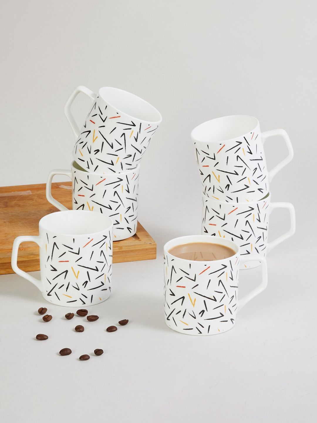 Home Centre Pack Of 6 White & Black Printed Bone China Glossy Cups and Mugs Price in India