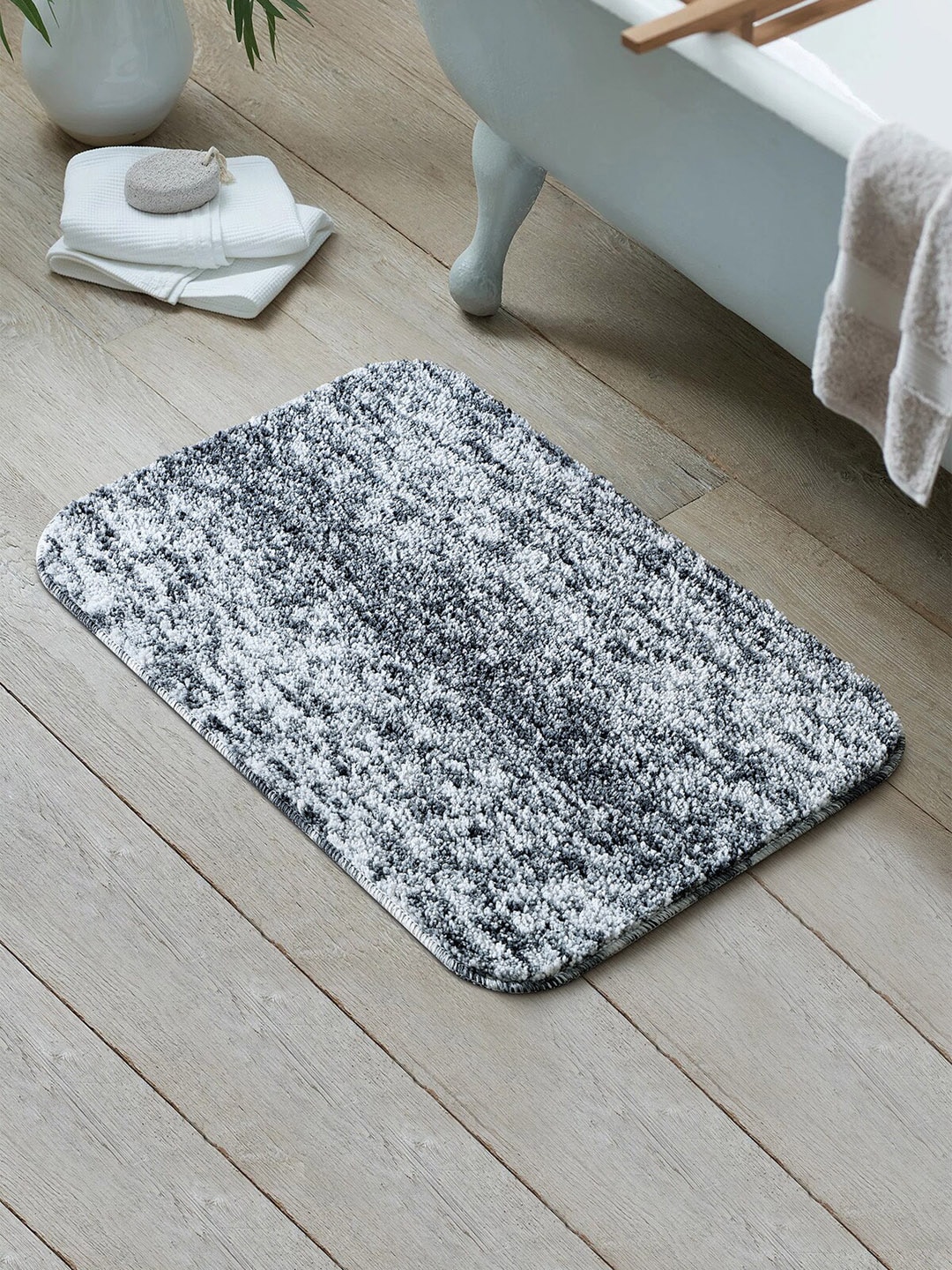 OBSESSIONS Charcoal & White Solid 1300 GSM Bath Rug Price in India