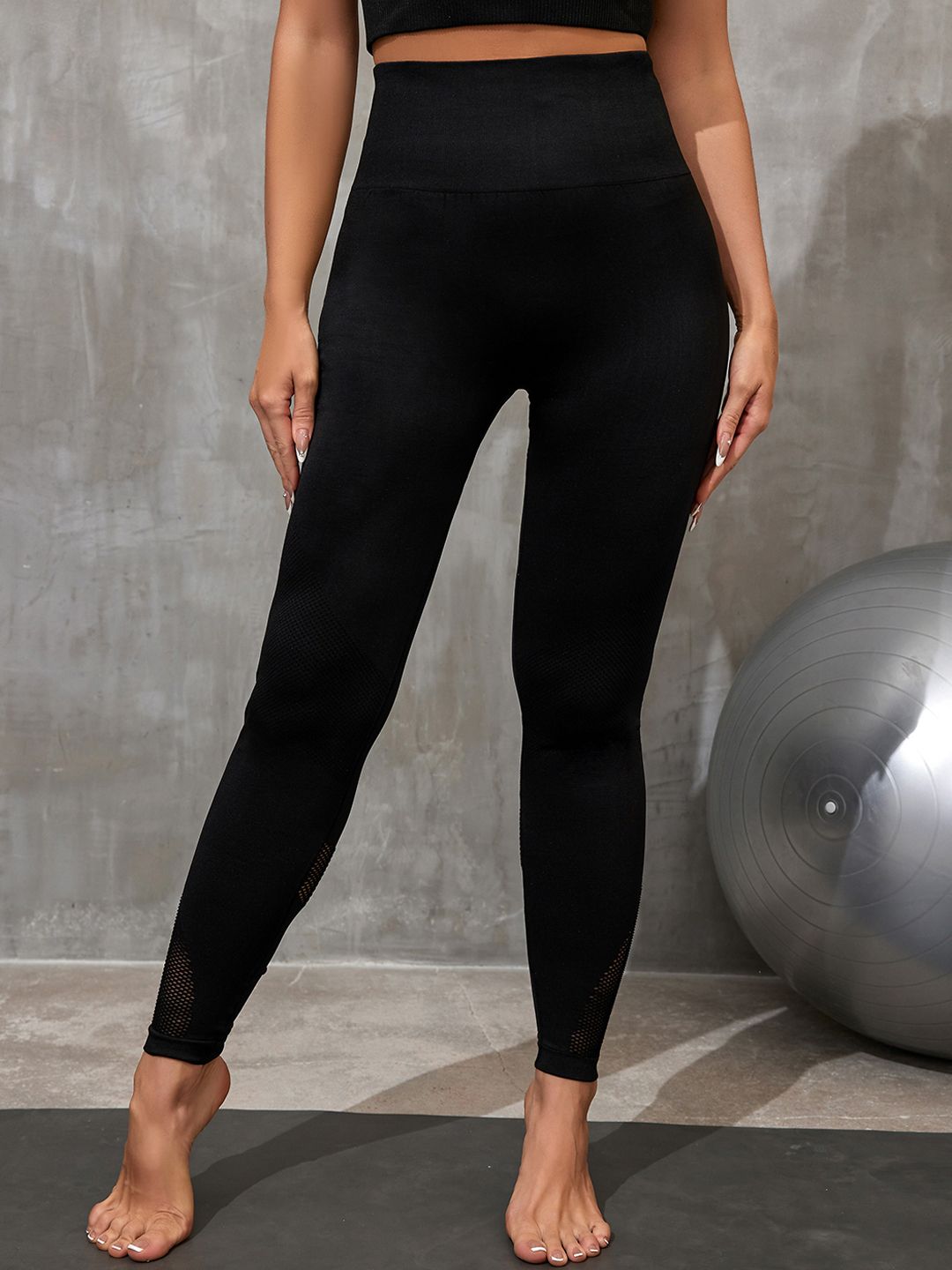 URBANIC Women Black Solid Gym Tights Price in India