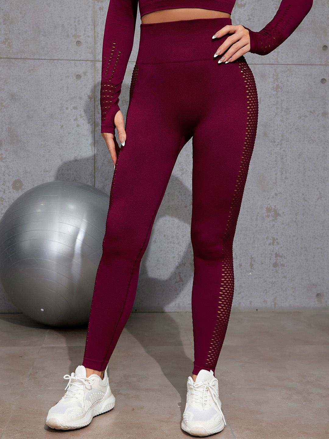 URBANIC Women Burgundy Solid Gym Tights Price in India