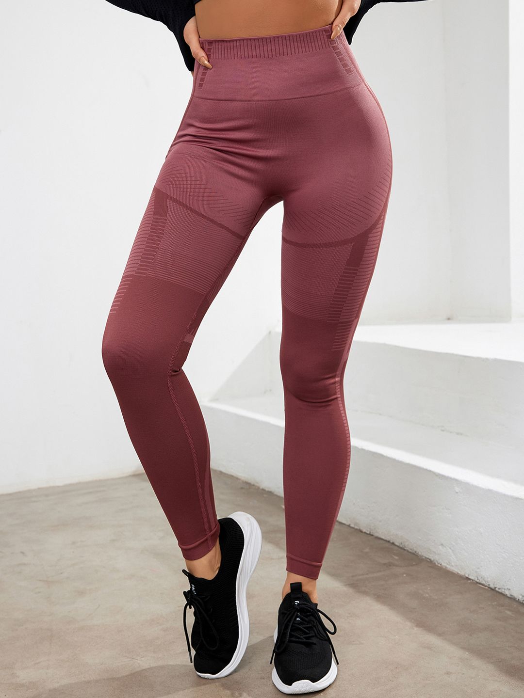 URBANIC Women Red Solid Gym Tights Price in India