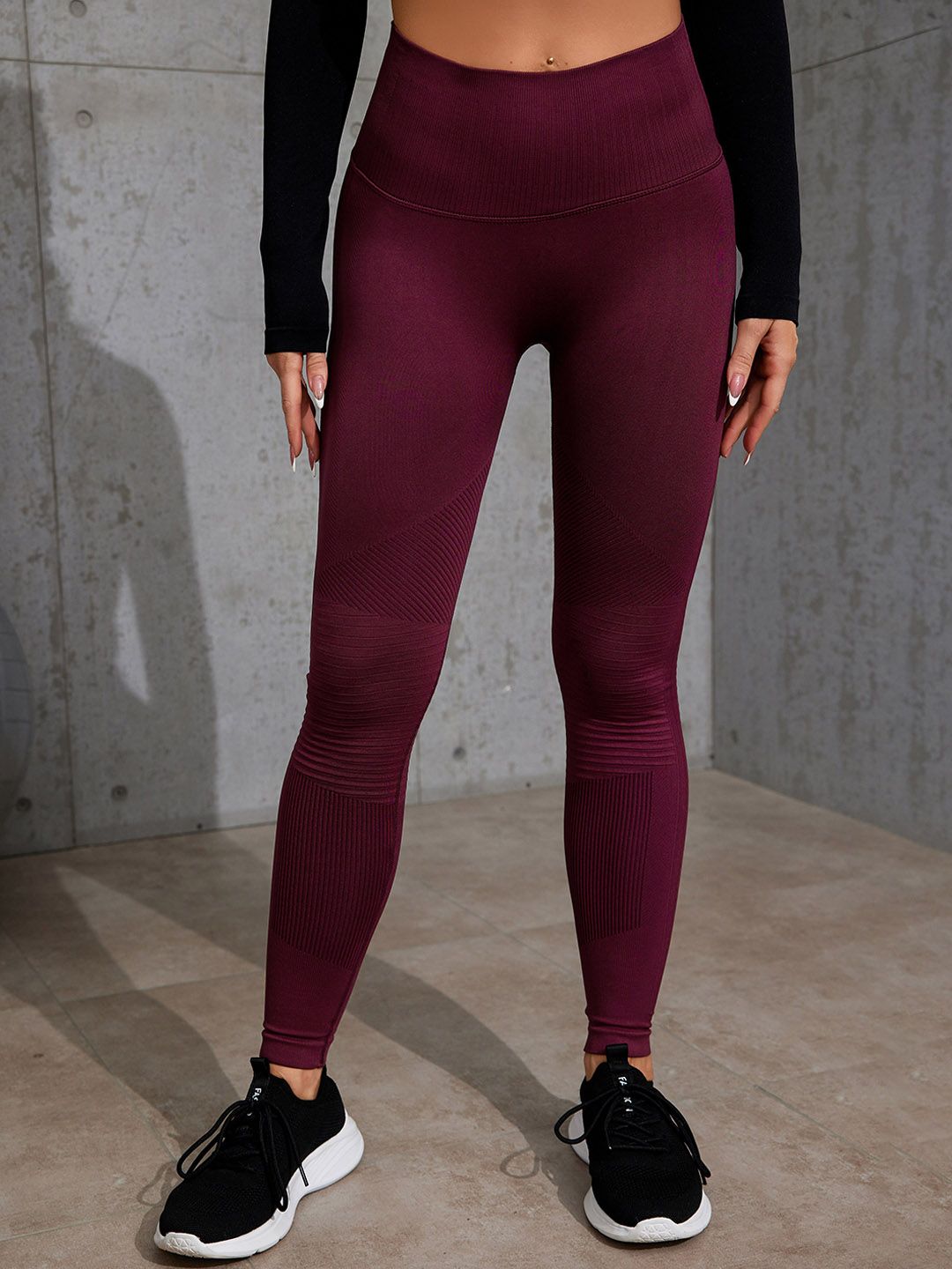 URBANIC Women Red Solid Gym Tights Price in India