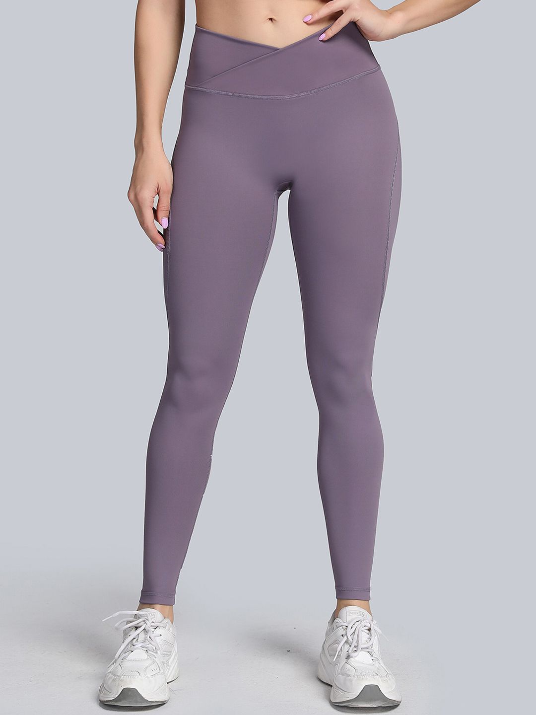 URBANIC Women Purple Solid Ankle Length Gym Tights Price in India