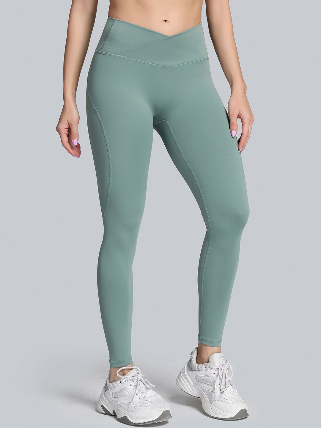 URBANIC Women Green Solid Ankle Length Gym Tights Price in India