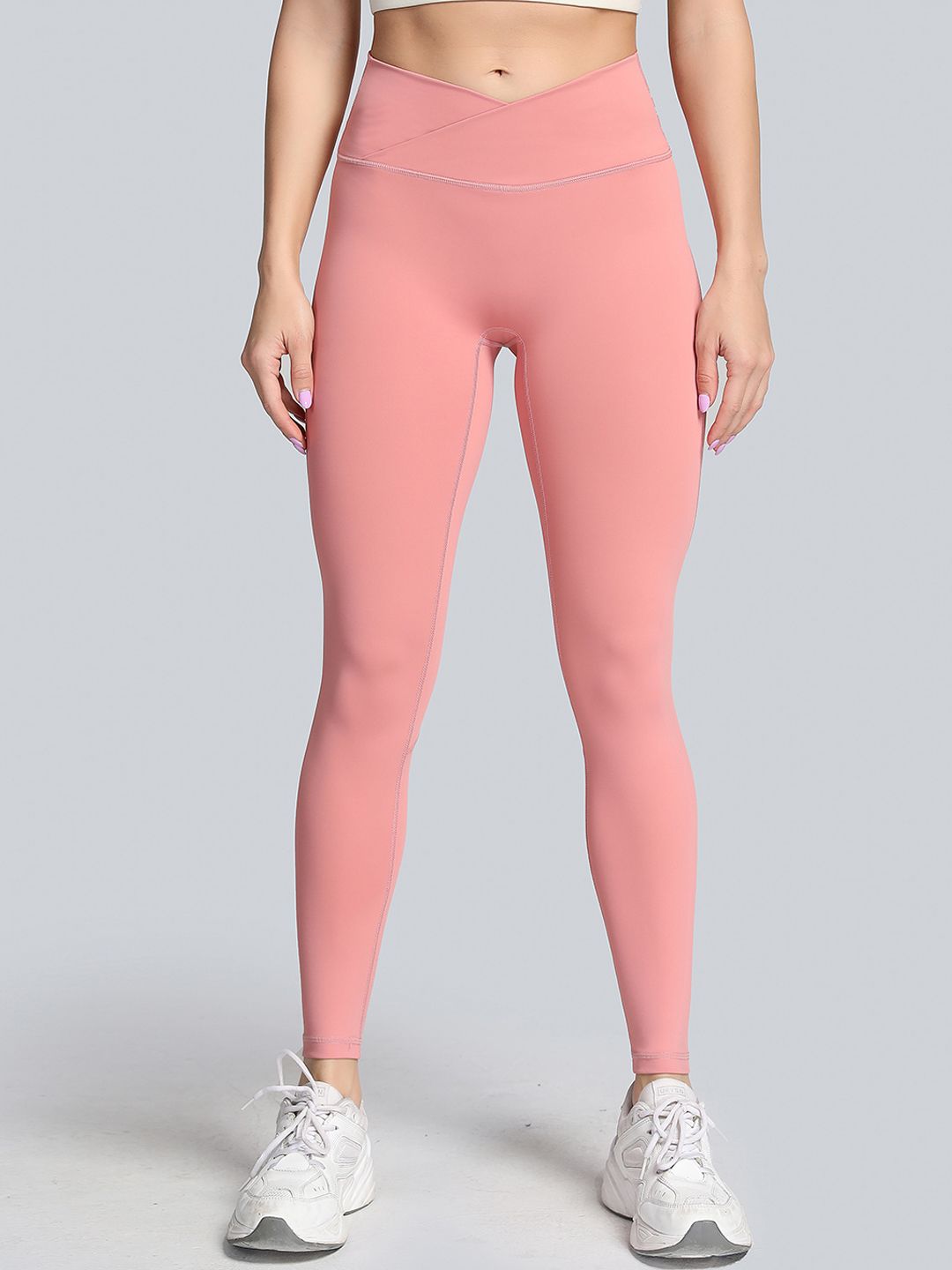 URBANIC Women Pink Solid Gym Tights Price in India