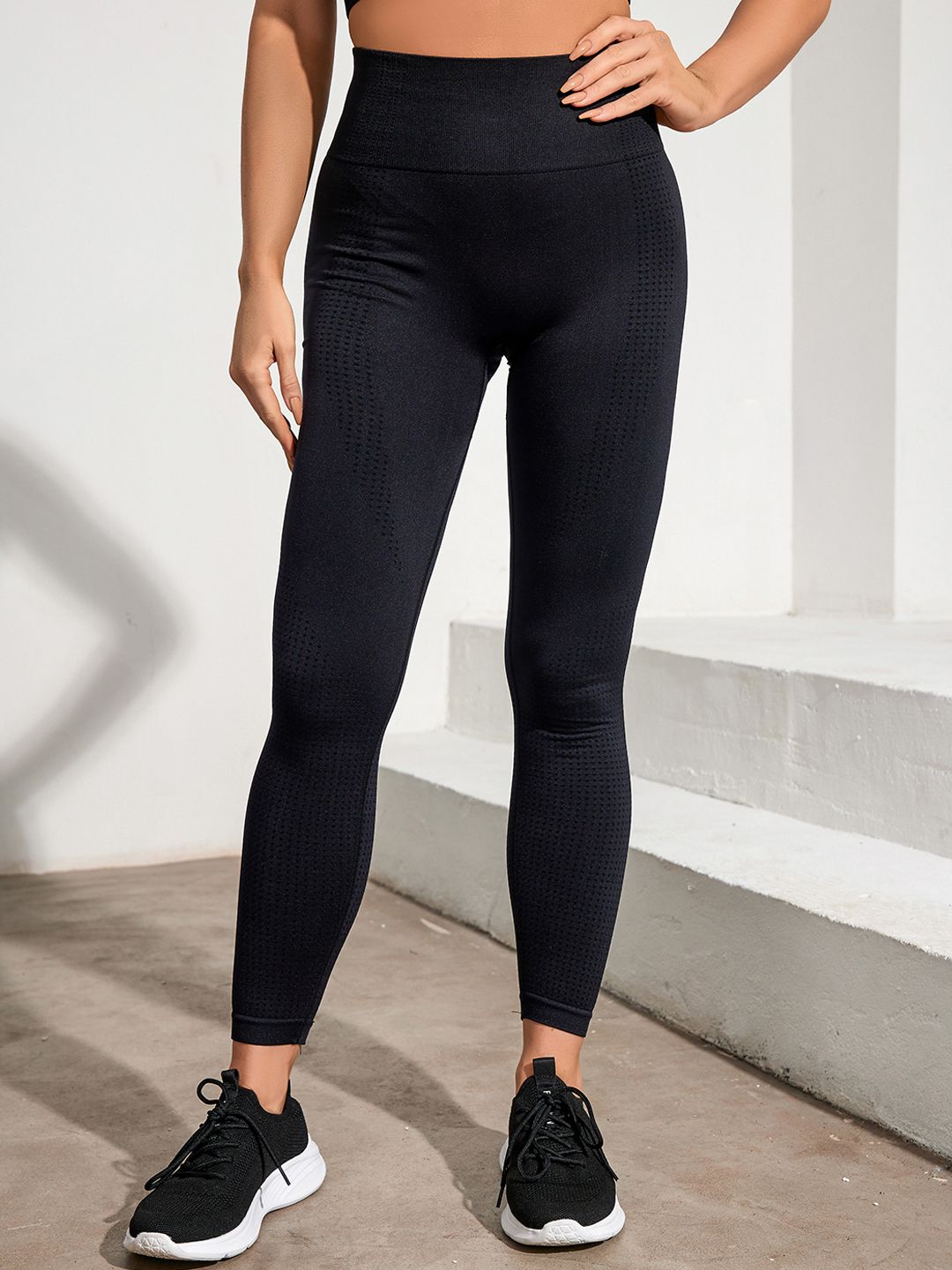 URBANIC Women Black Solid Gym Tights Price in India