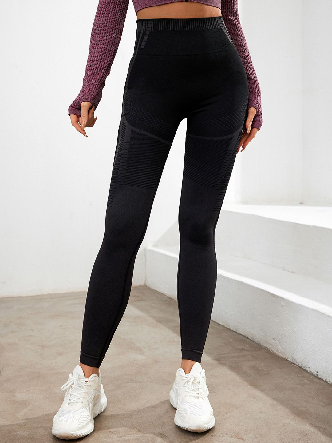 URBANIC Women Black Solid Gym Tights Price in India