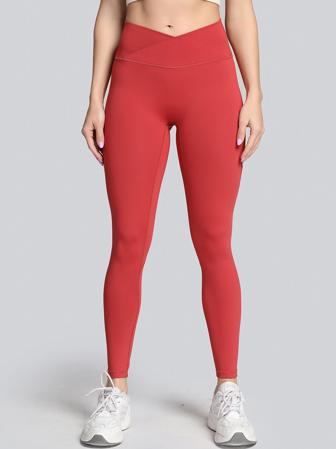 URBANIC Women Red Solid Ankle Length Training & Gym Tights Price in India