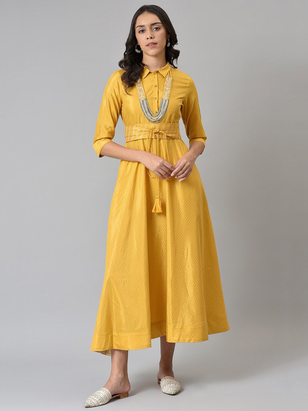 W Yellow Ethnic Motifs Tie-Up Neck Satin Ethnic Midi Dress Price in India