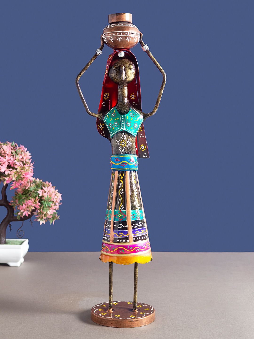 Golden Peacock Pink & Yellow Hand-Painted Tribal Metal Showpiece Price in India