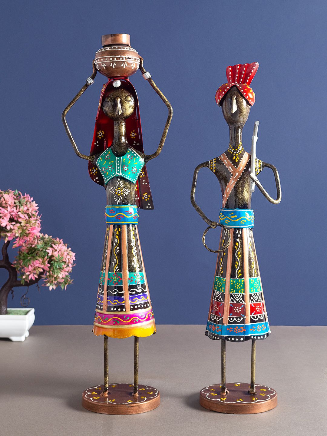 Golden Peacock MultiColoured Pack Of 2 Tribal Metal Hand-Painted Couple Showpiece Price in India