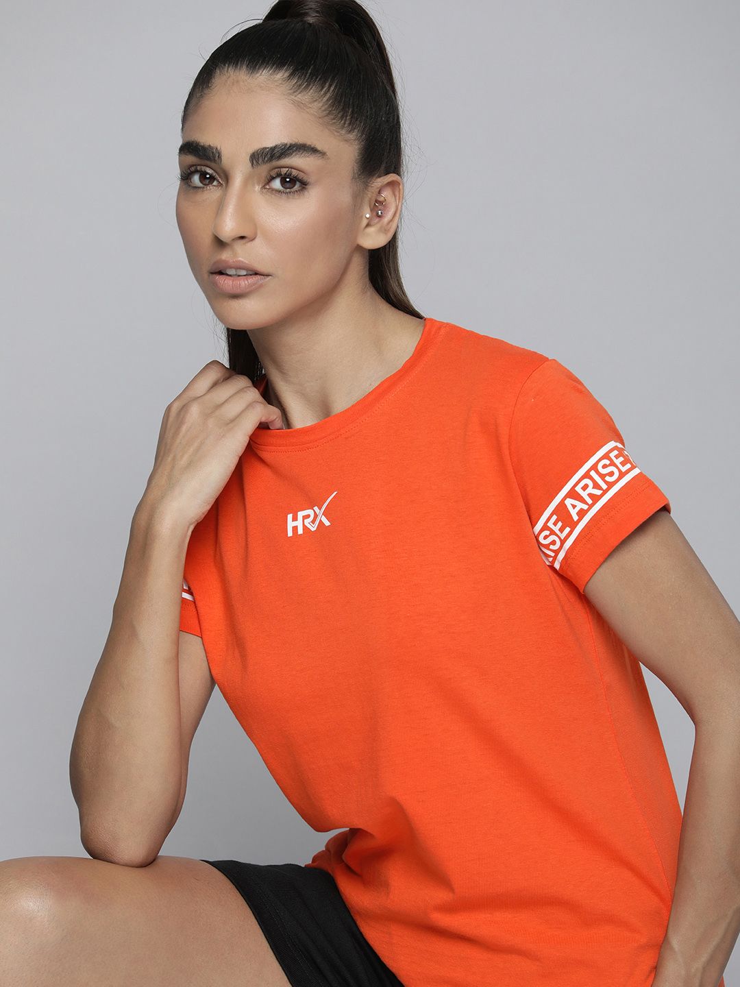 HRX by Hrithik Roshan Women Orange Brand Logo Printed Pure Cotton T-shirt Price in India
