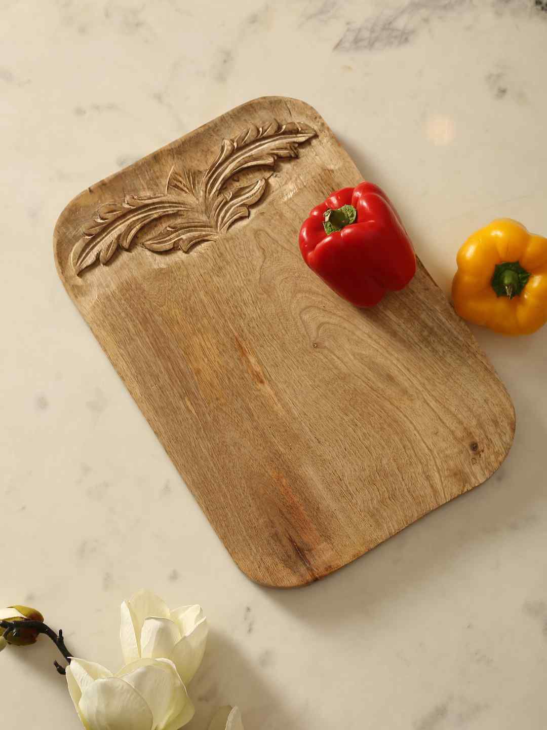 Amoliconcepts Brown Flower Design Hand Carved Chopping Board Price in India