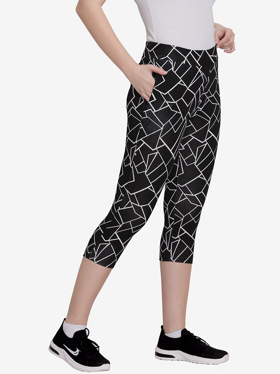 MAYSIXTY Women Black Geometric Printed Cotton Track Pants Price in India