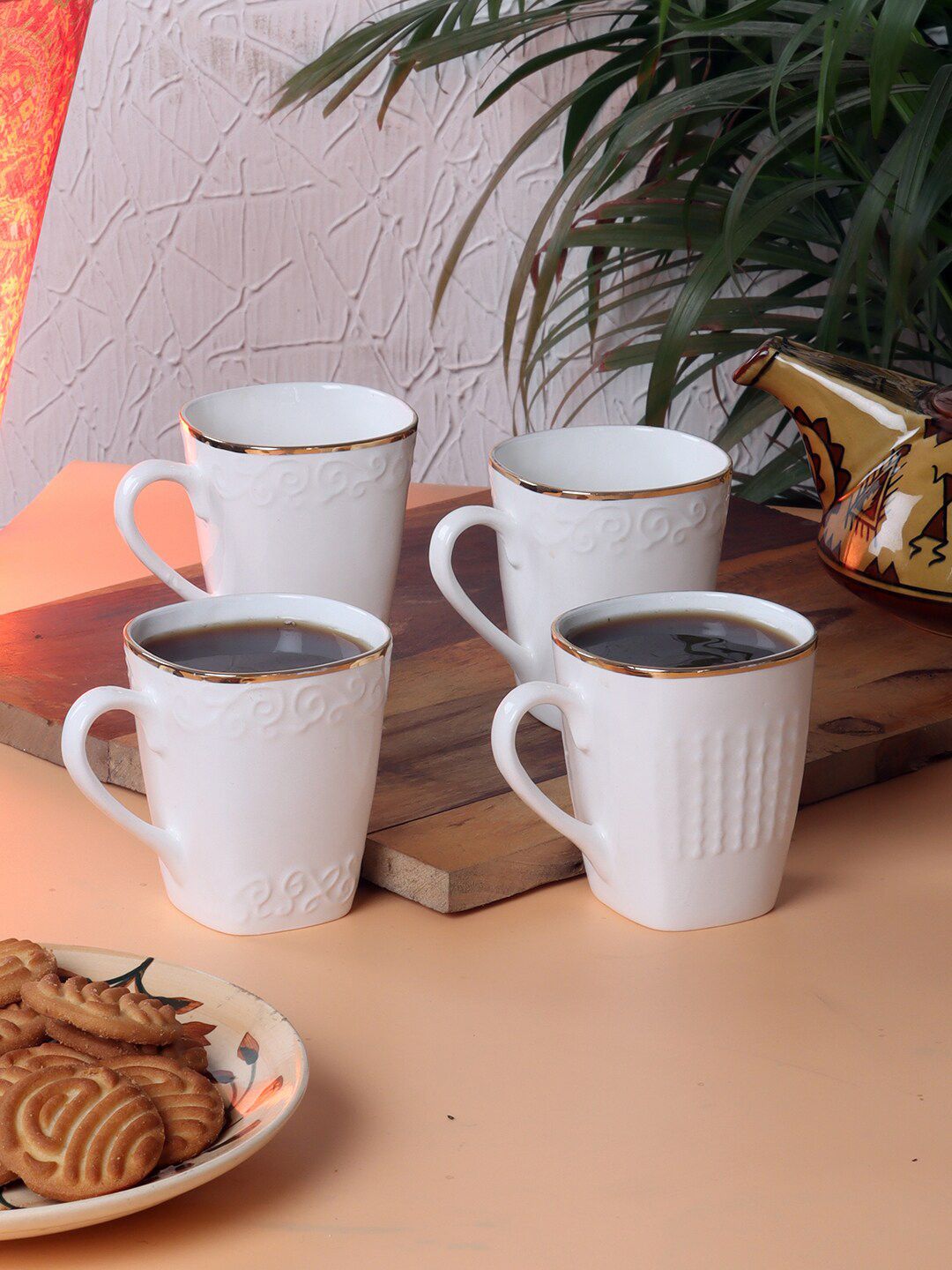 CDI Set of 4 White & Gold-Toned Solid Bone China Glossy Mugs Set of Cups and Mugs Price in India