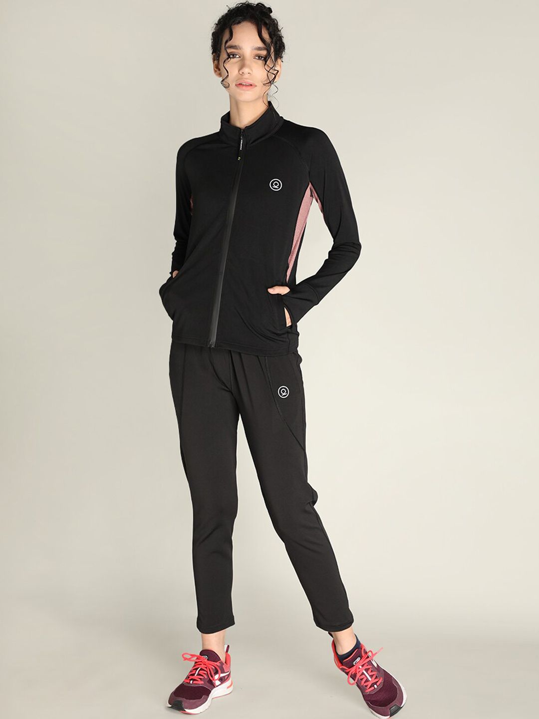 CHKOKKO Women Black Solid Sports Tracksuit Price in India