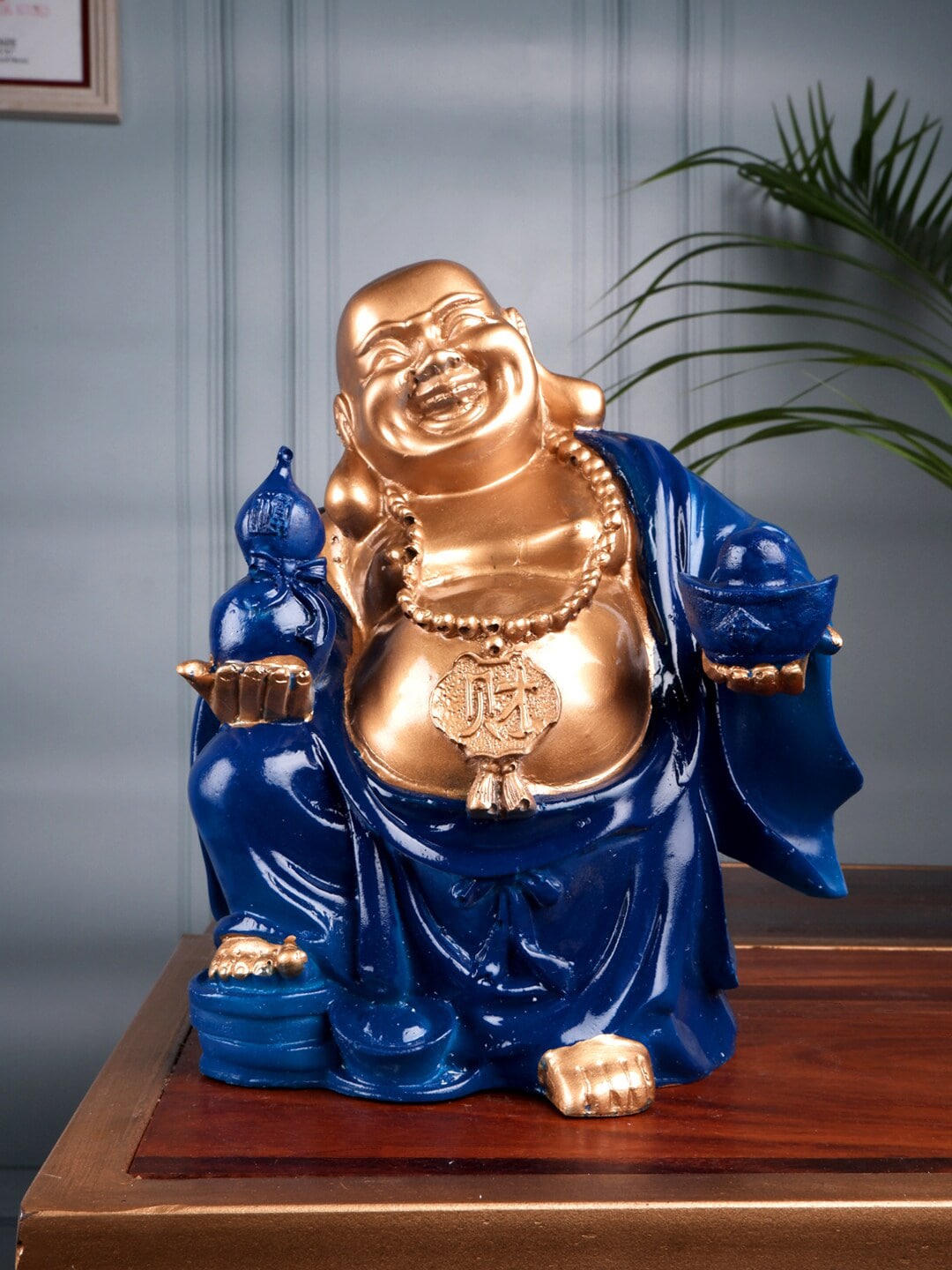 THE WHITE INK DECOR Blue & Gold-Toned Decorative Laughing Buddha figurine Showpiec Price in India