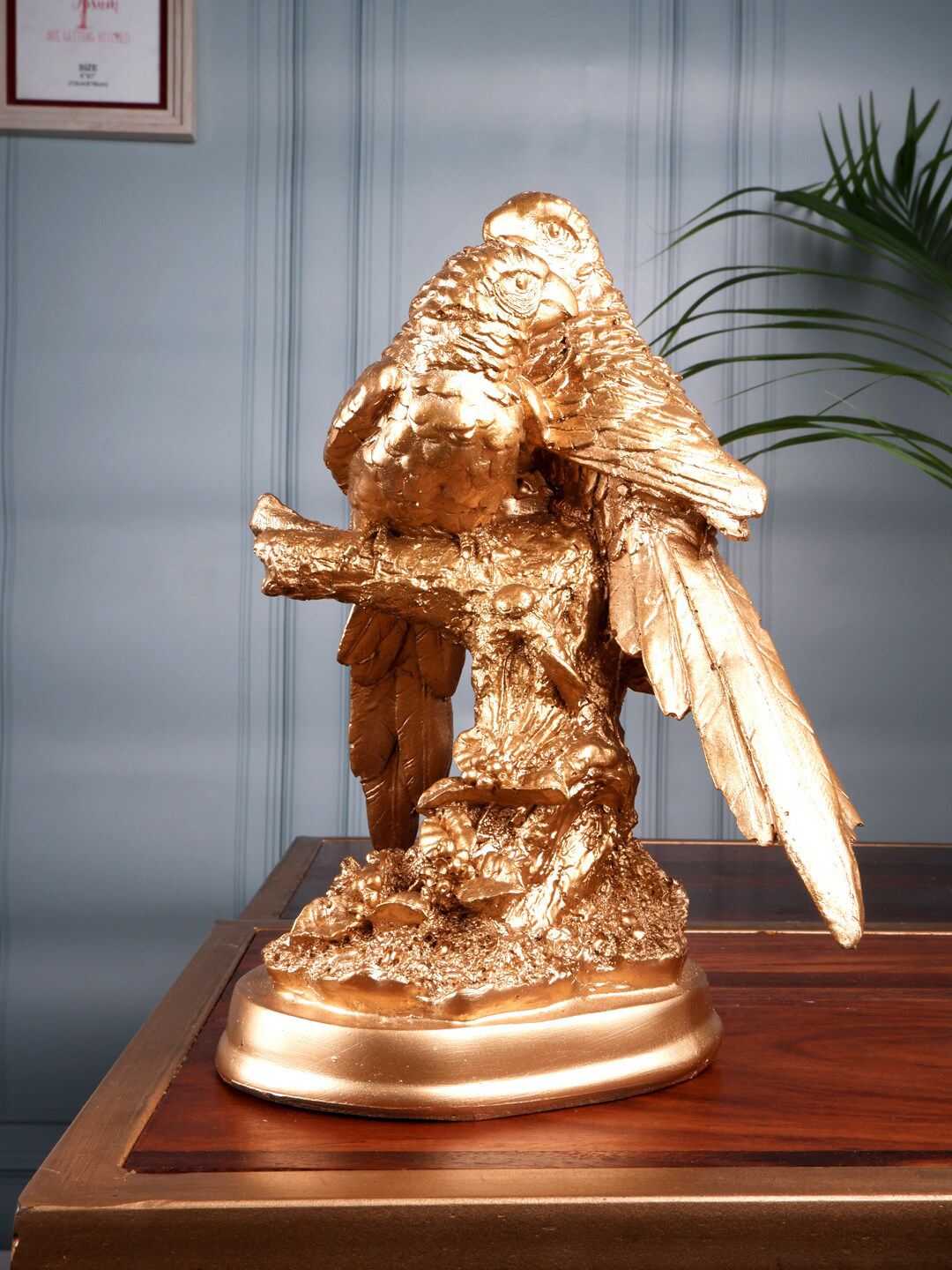THE WHITE INK DECOR Gold-Toned Parrot Figurine Price in India