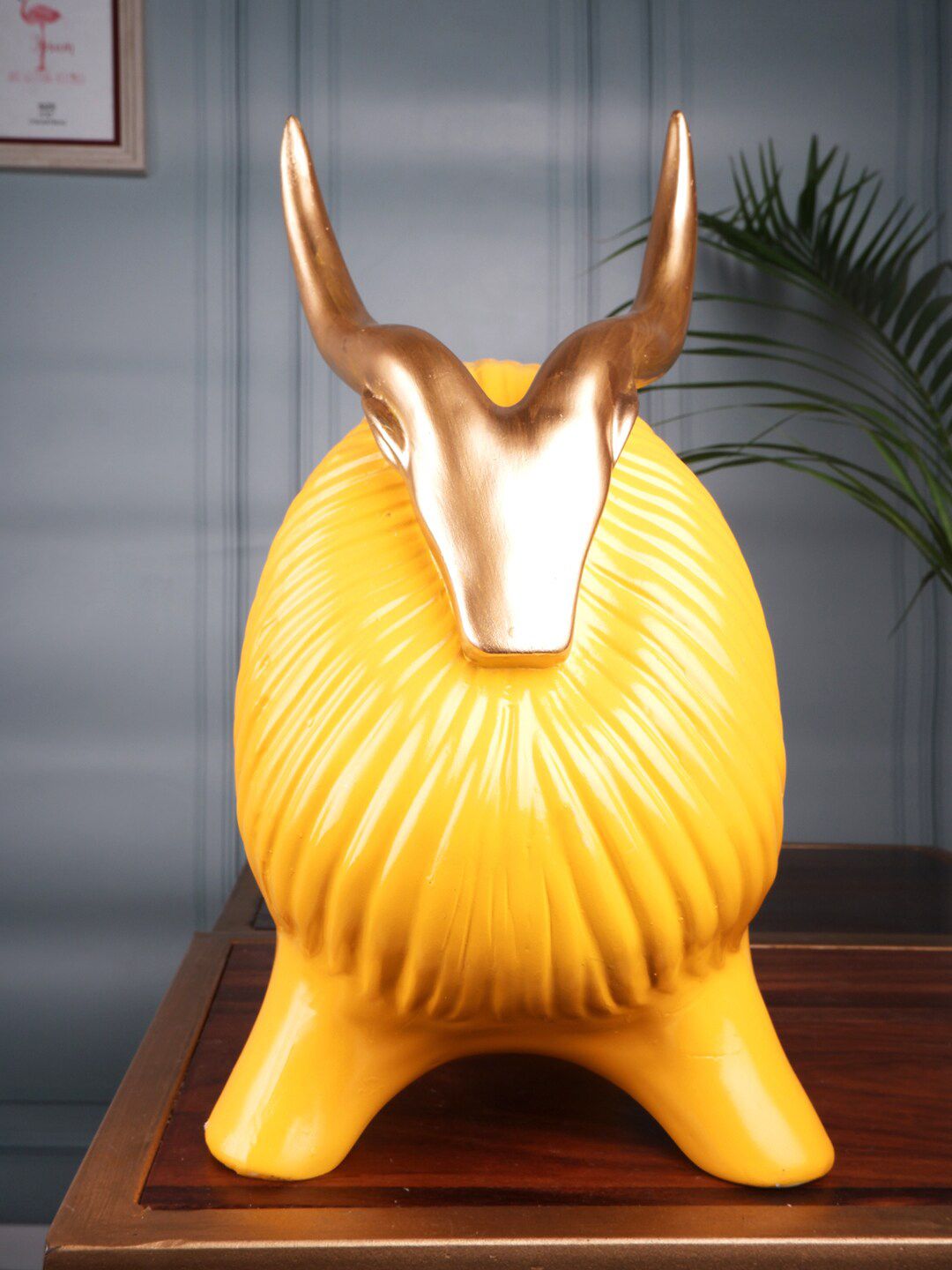 THE WHITE INK DECOR Yellow Yak Figurine Price in India