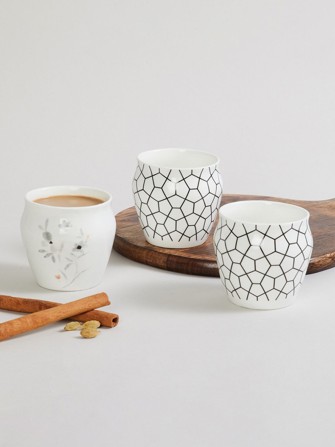 Home Centre White & Black Printed Bone China Glossy Kulladhs Pack of 3 Cups and Mugs Price in India