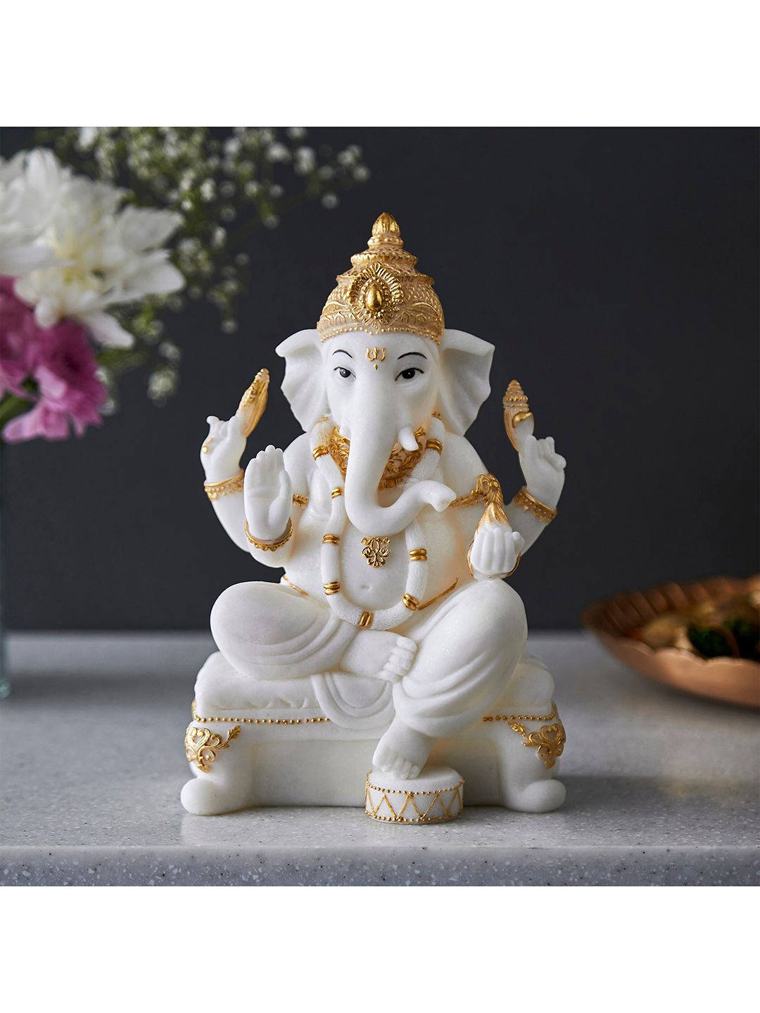 Home Centre White Textured Sitting Ganesha Figurine Showpieces Price in India