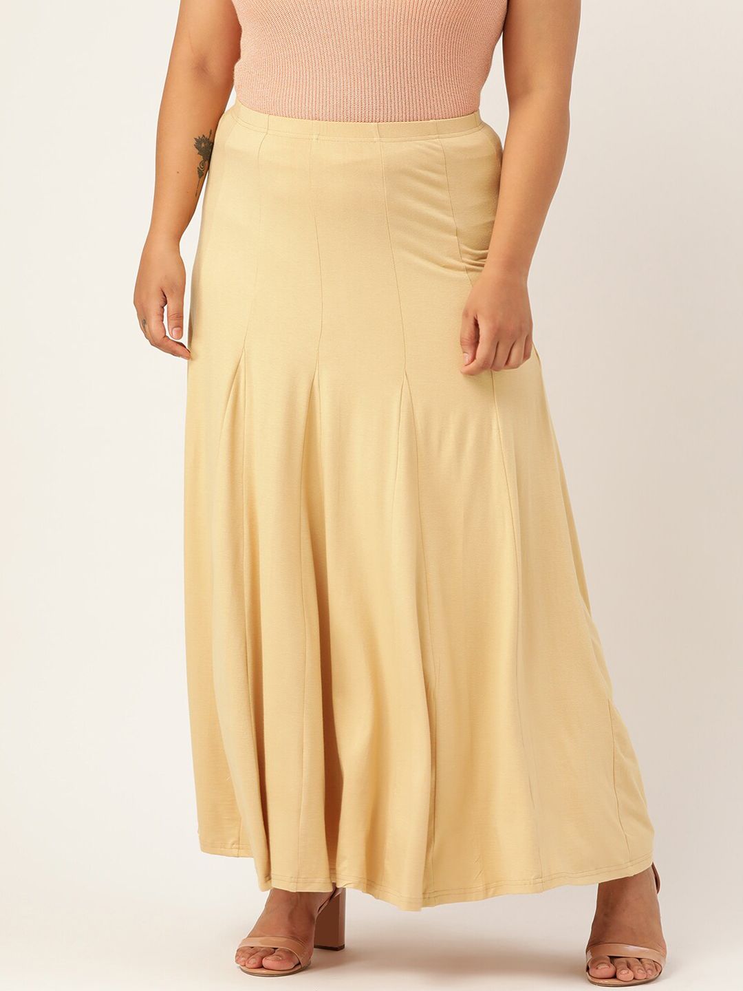 theRebelinme Women Beige Solid Flared Panelled Maxi Skirt Price in India