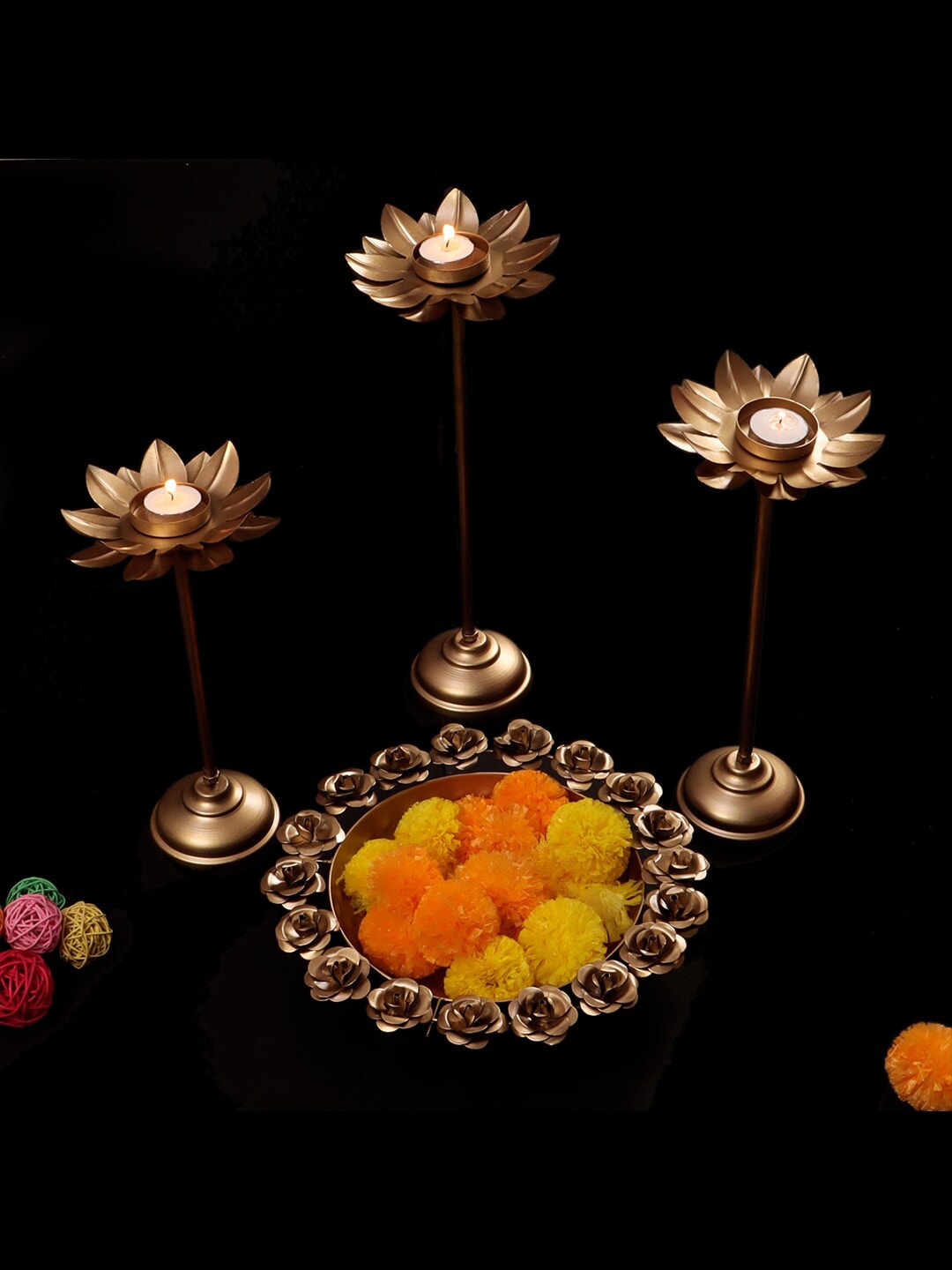 Amaya Decors Set Of 4 Gold-Toned Rose Urli Price in India