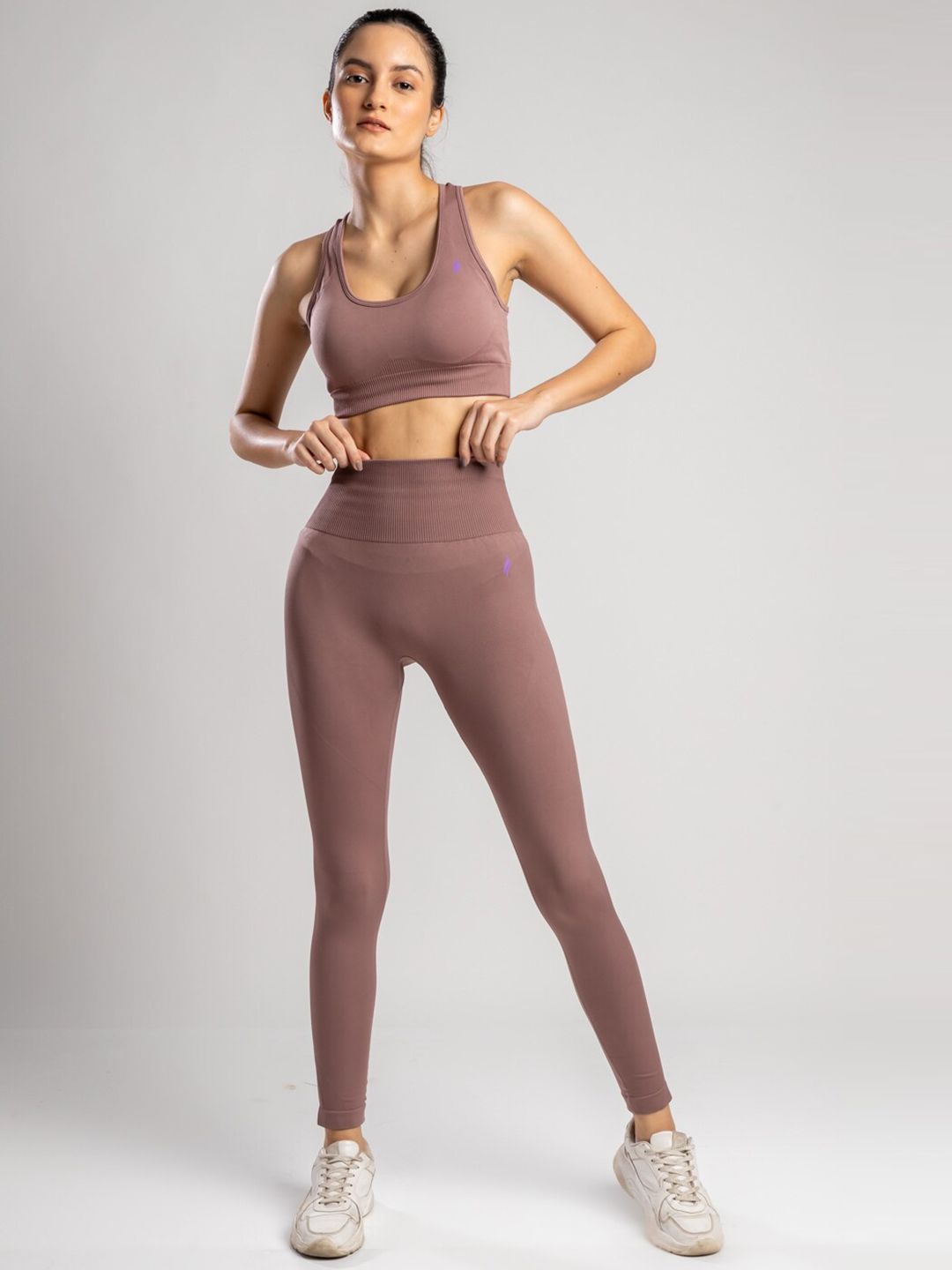 SKNZ Women Purple Solid Tracksuit Price in India