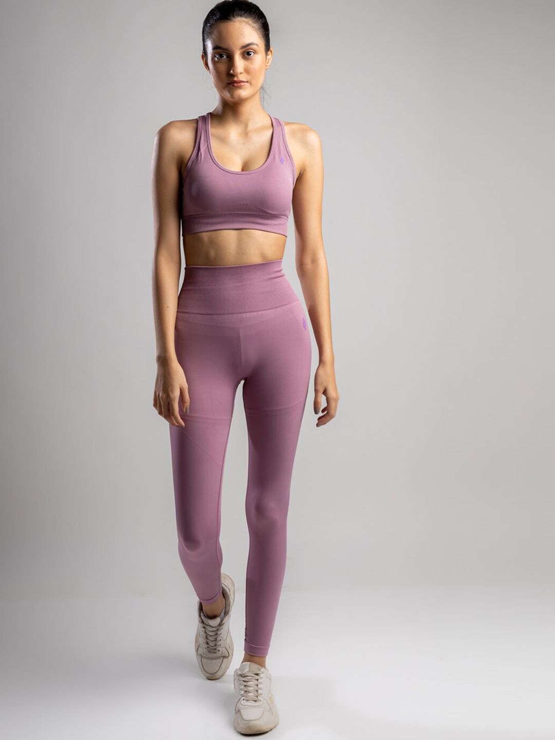 SKNZ Women Purple Solid Tracksuit Price in India