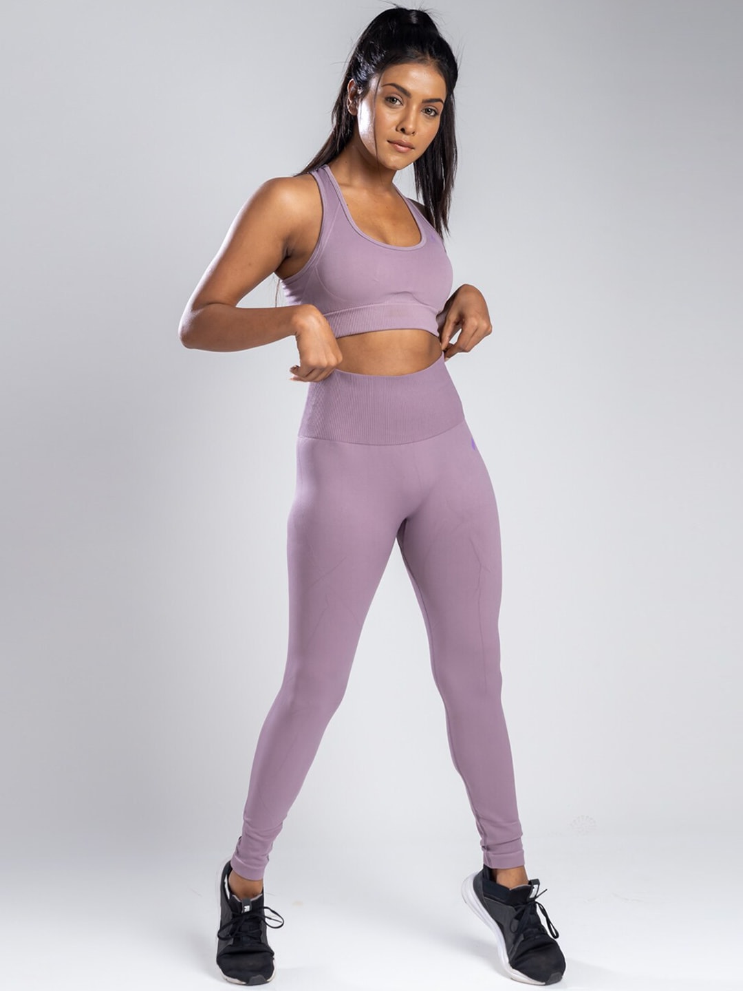 SKNZ Women Purple Solid Tracksuits Price in India