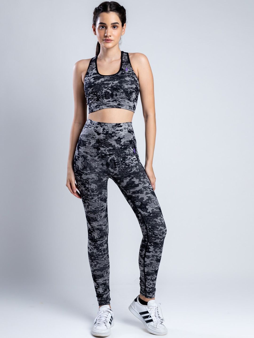 SKNZ Women Black Camouflage Printed Tracksuits Price in India