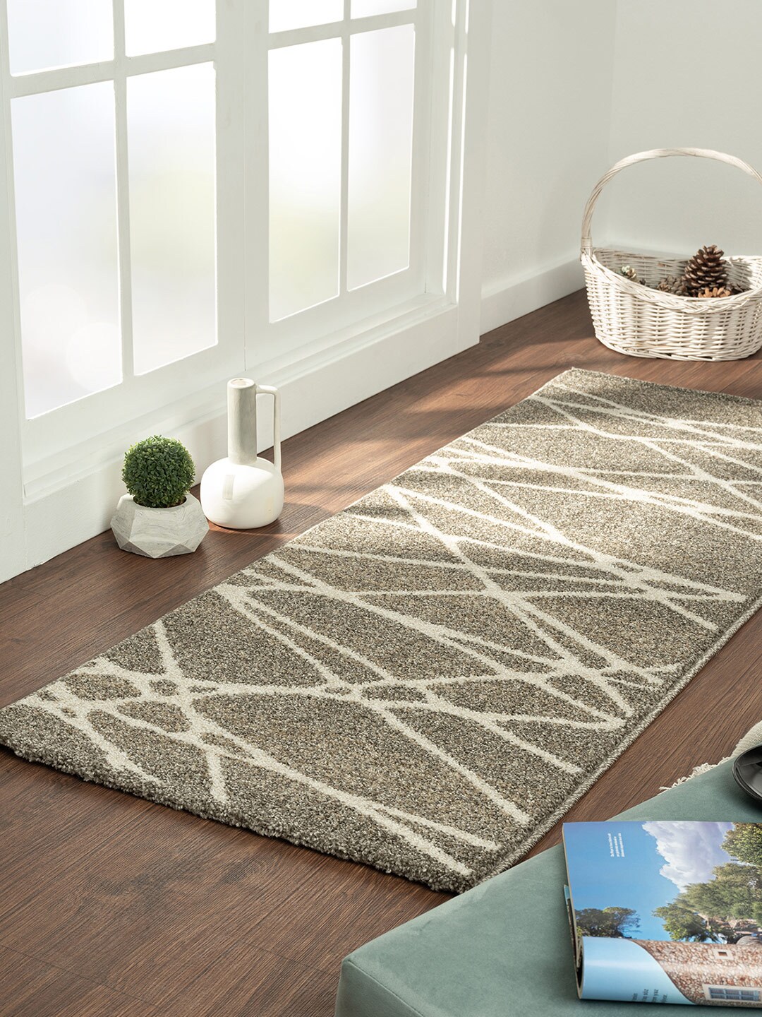 OBSESSIONS Beige Abstract Rectangular Carpet Price in India
