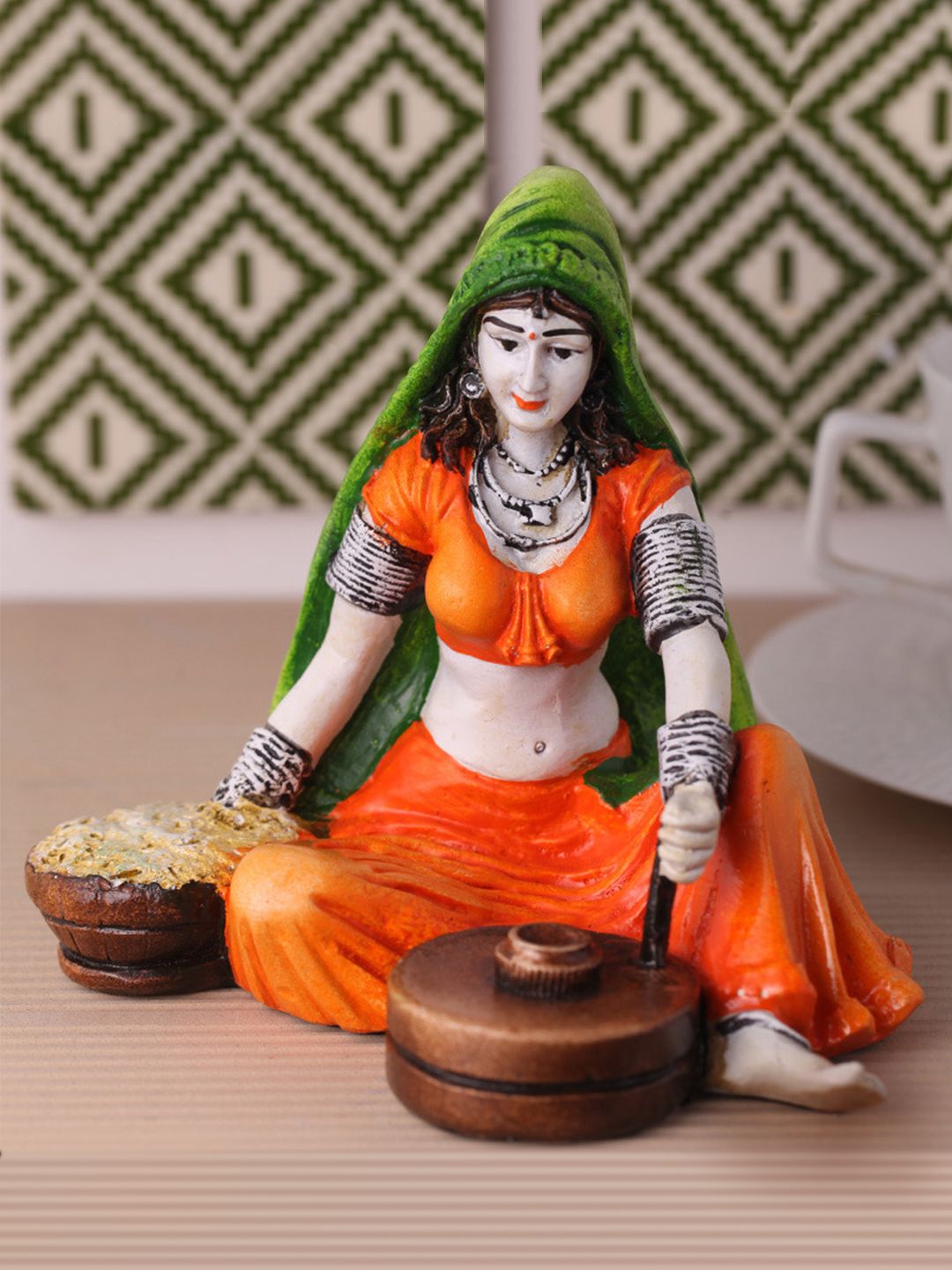 eCraftIndia Orange & Green Handcrafted Polyresin Rajasthani Lady Showpiece Price in India